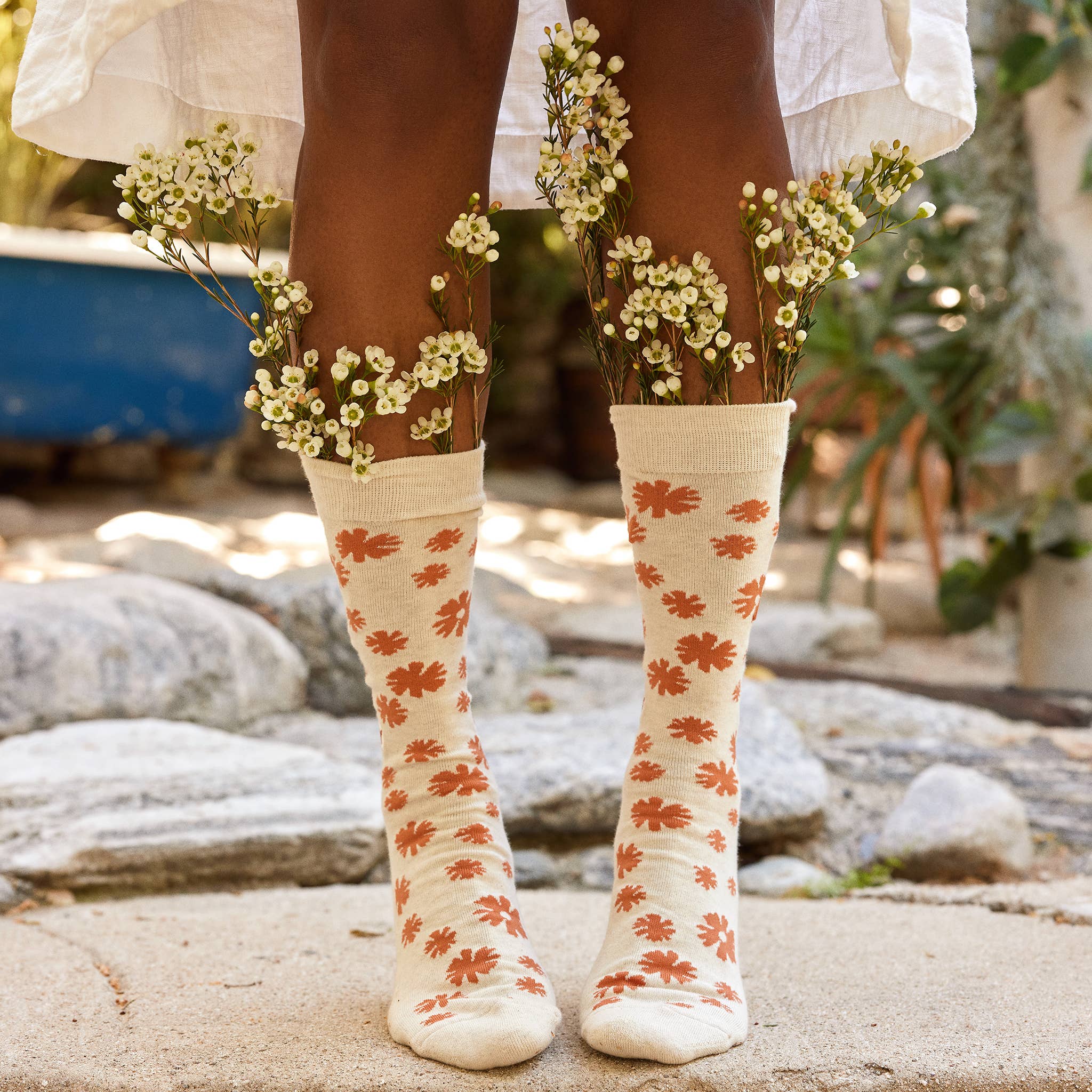 Socks that Stop Violence Against Women (Orange Flowers) by Conscious Step