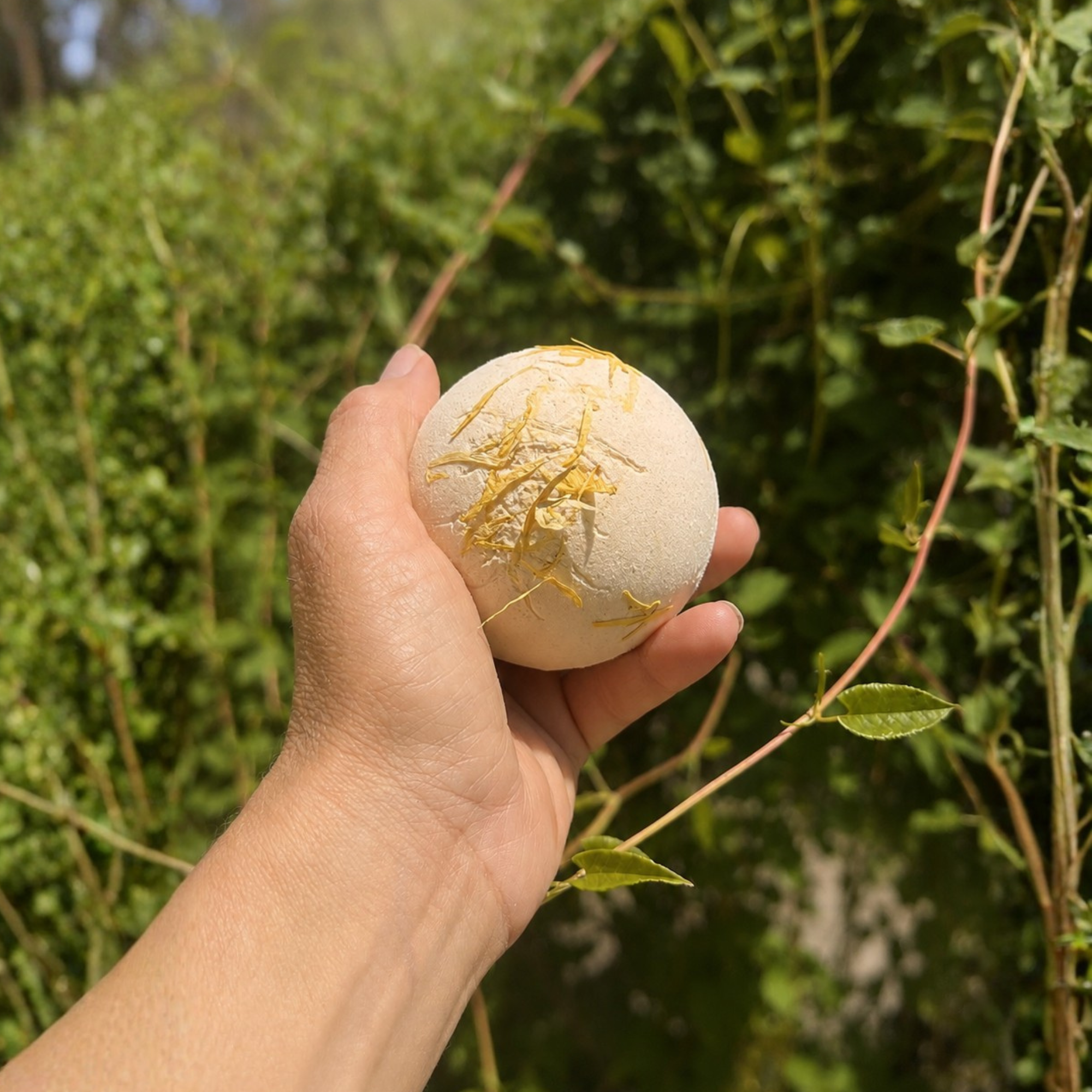 The Golden Hour Bath Bomb in Golden Honey by Sow the Magic