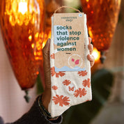 Socks that Stop Violence Against Women (Orange Flowers) by Conscious Step