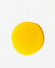 A bright yellow circle on white evokes the natural radiance and hydration of Good Flower Farm’s Golden Glow Facial Serum.