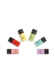 The Rainbow Organic Lip Balm Set of 6 by Good Flower Farm features biodegradable tubes in vanilla, mint, coconut, strawberry, watermelon, and peach flavors arranged in a semi-circle on a white background.